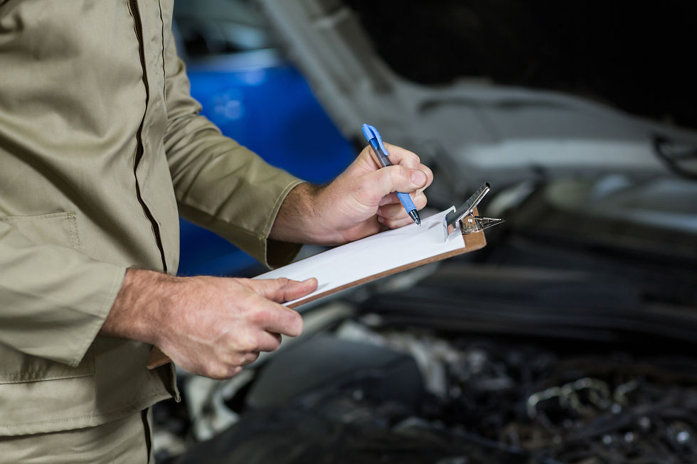 mid-section-mechanic-preparing-check-list.jpg