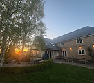 Evening sun setting over kingfisher house