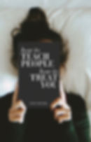 Woman holding the book How To Teach People How To Treat You by Pete Moore.
