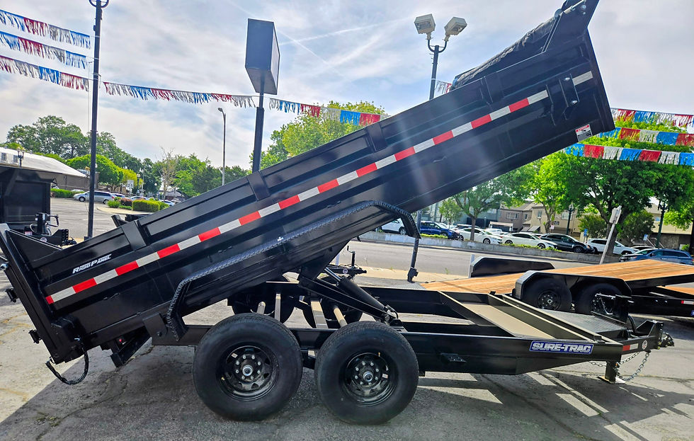 High angle view of a dump trailer loaded with landscaping materials ready for transport