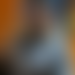 A woman holding a brown cat