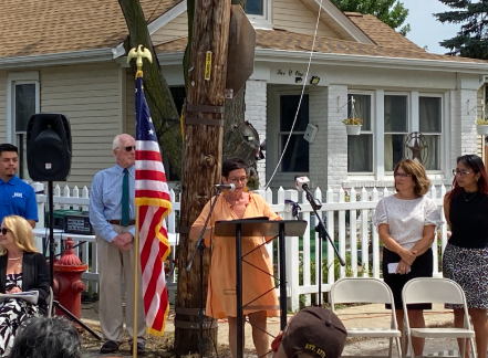 Pictured: Representative Manley reads from House Resolution 0289 during a street renaming ceremony honoring SSG Jose Dueñez Jr. Way, Joliet, earlier this year.