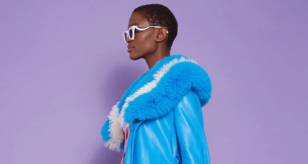 Close-up view of a luxurious oversized faux fur coat