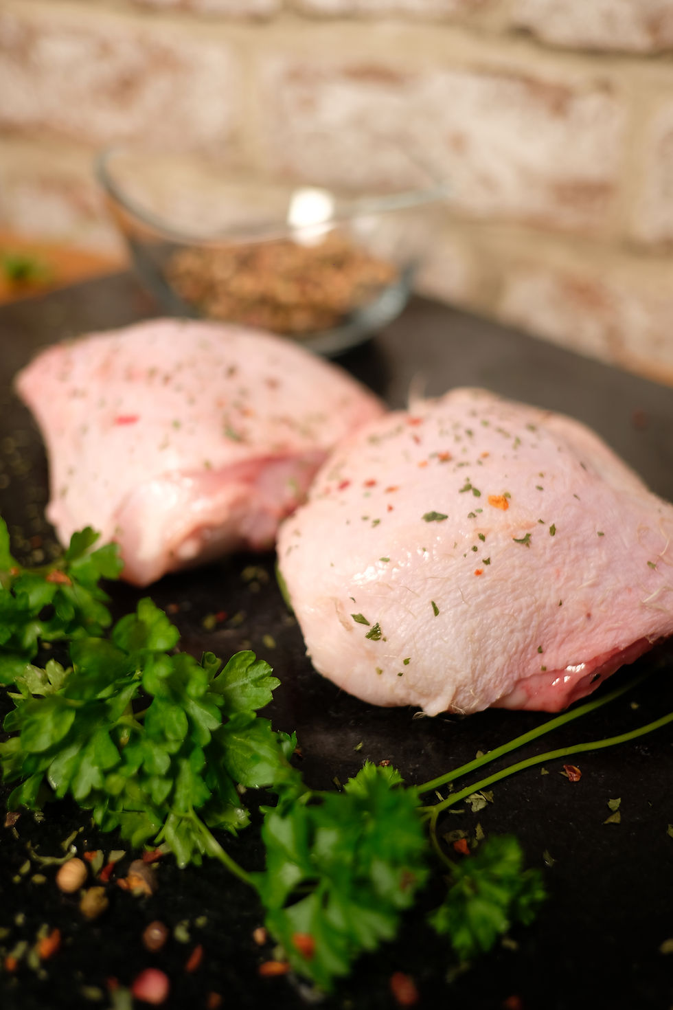 Thumbnail: Seasoned raw chicken breasts with parsley