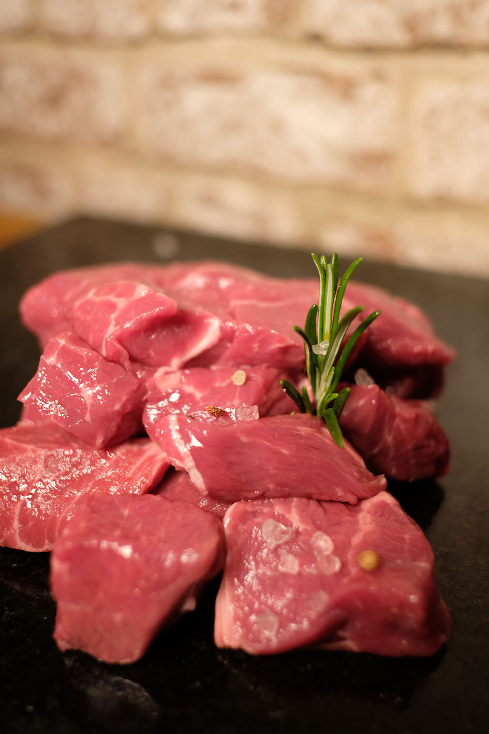 Thumbnail: Raw diced meat with rosemary