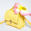 Miniature : sac trapèze en cuir jaune façon crocodile