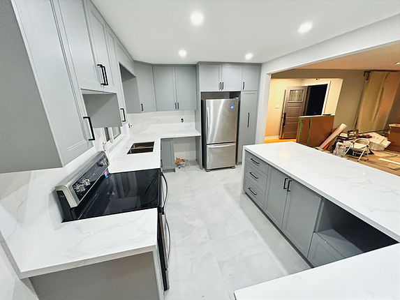Luxury kitchen renovation in Toronto by ACI Reno featuring custom cabinetry and sleek countertops