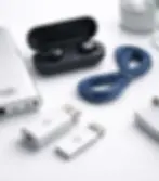 Werbemittel der Remise GmbH Recklinghausen: USB-Sticks, Powerbank und Kopfhörer für den Bereich Elektronik-Service.