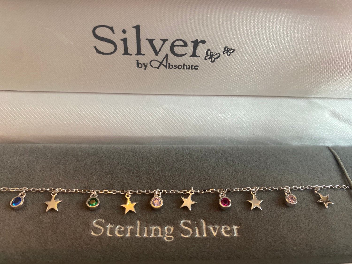 Charm Bracelet with star and colour jewels 