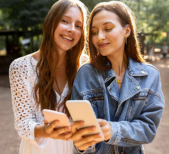 young-girlfriends-with-mobile.jpg