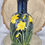 Thumbnail: Navy blue glass vase featuring hand painted daffodils