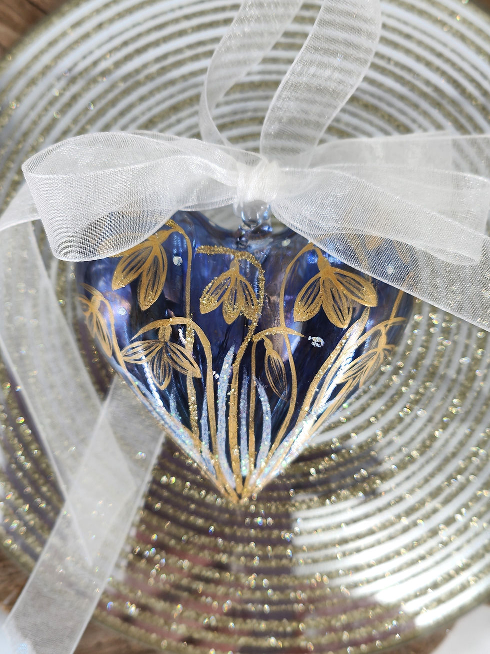 Thumbnail: Blue Glass Heart Bauble - Golden snowdrops & white shimmer ribbons