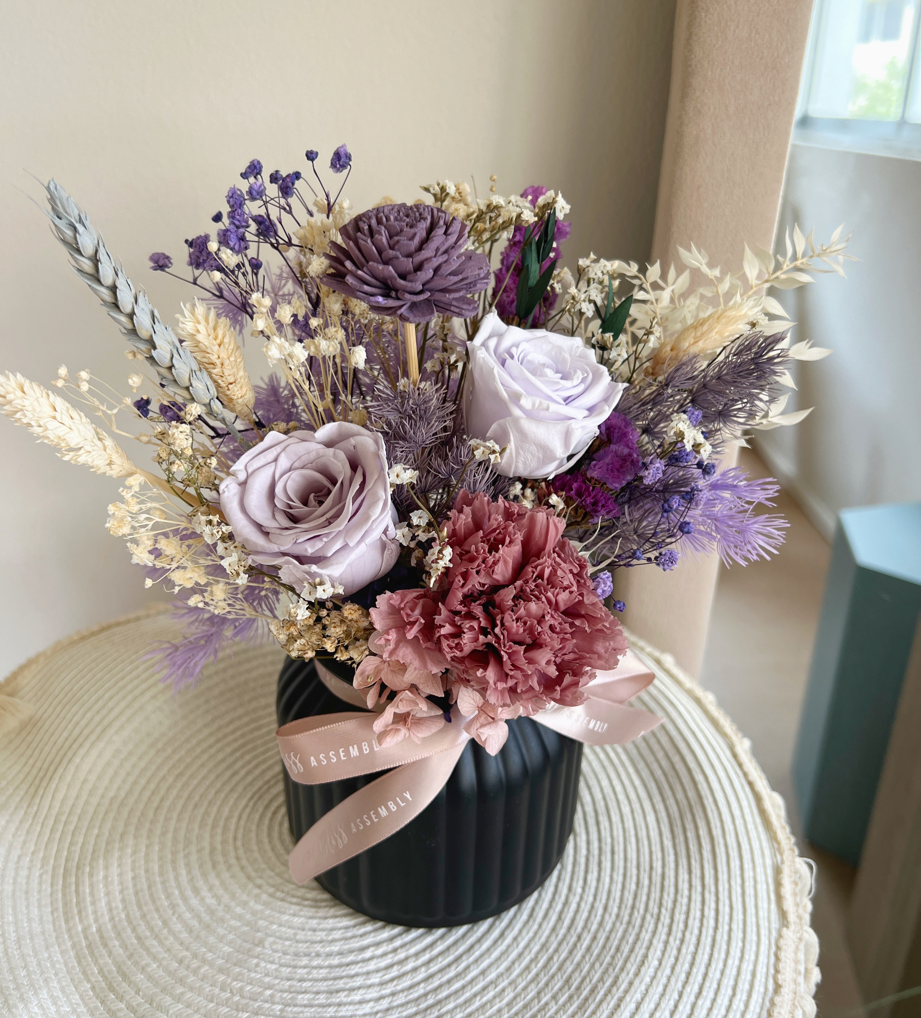 Preserved purple flowers vase