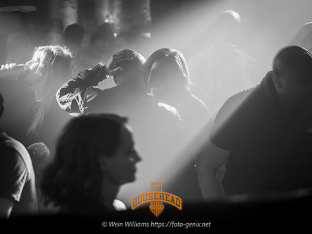 A conversation on a nightclub floor