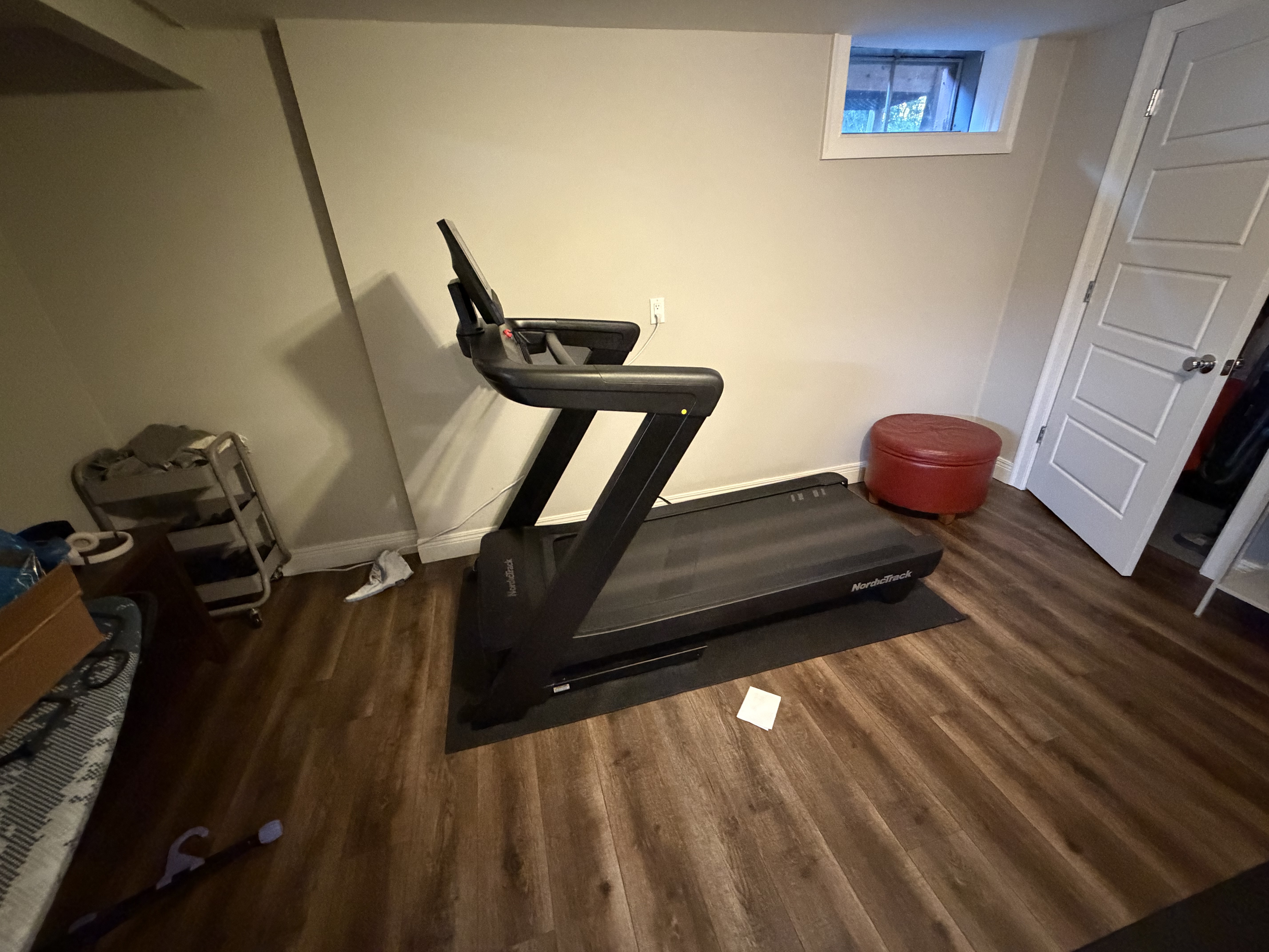 Treadmill set up in a residential exercise room