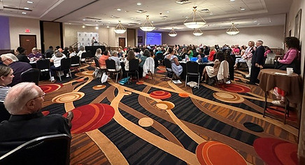 Dr. Hopkins asking question full room.jpg