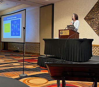 Christine Hartford speaking.jpg
