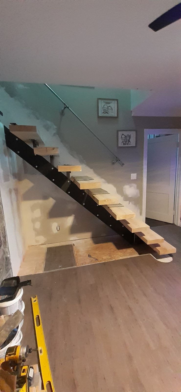 Image of an under-construction wooden staircase