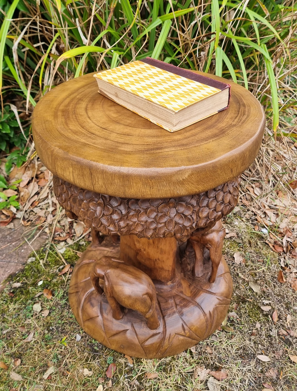 Thumbnail: Large hand carved Elephant forest side table, three elephants walking around under canopy of a tree, waxed finish