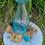 Thumbnail: melted glass on wood wine decanter with stopper beside
