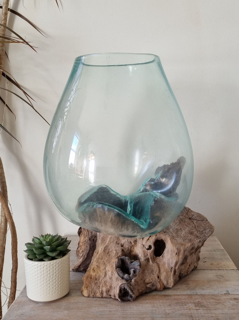 Extra large melted glass bowl on rustic gamal wood base shown from different angles