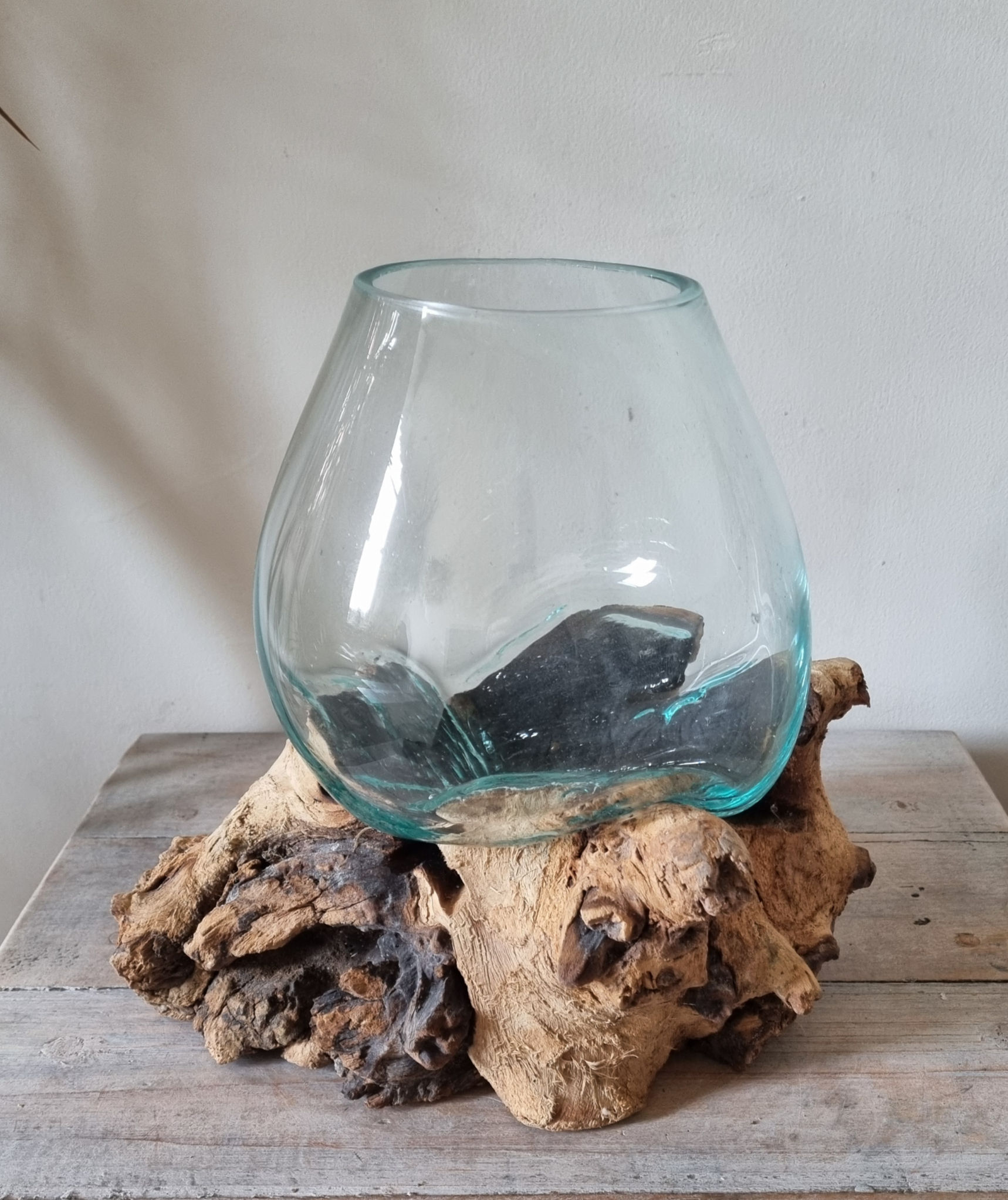 melted glass on wood bowl shown from different angles