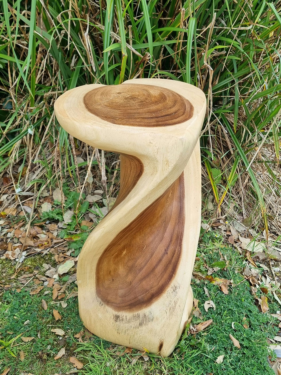 Thumbnail: Heart shaped hand carved twist table in a natural wood finish shown from different angles