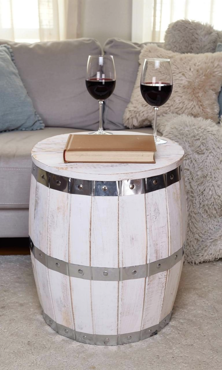 beer barrel side table or stool with interior storage, whitewashed finish shown with a book and two glasses of wine on top