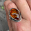 Thumbnail: Detailed setting amber ring