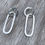 Thumbnail: Silver hammered long oval stud drop earrings
