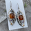 Thumbnail: Large artisan amber earrings with two tone silver and accent stones