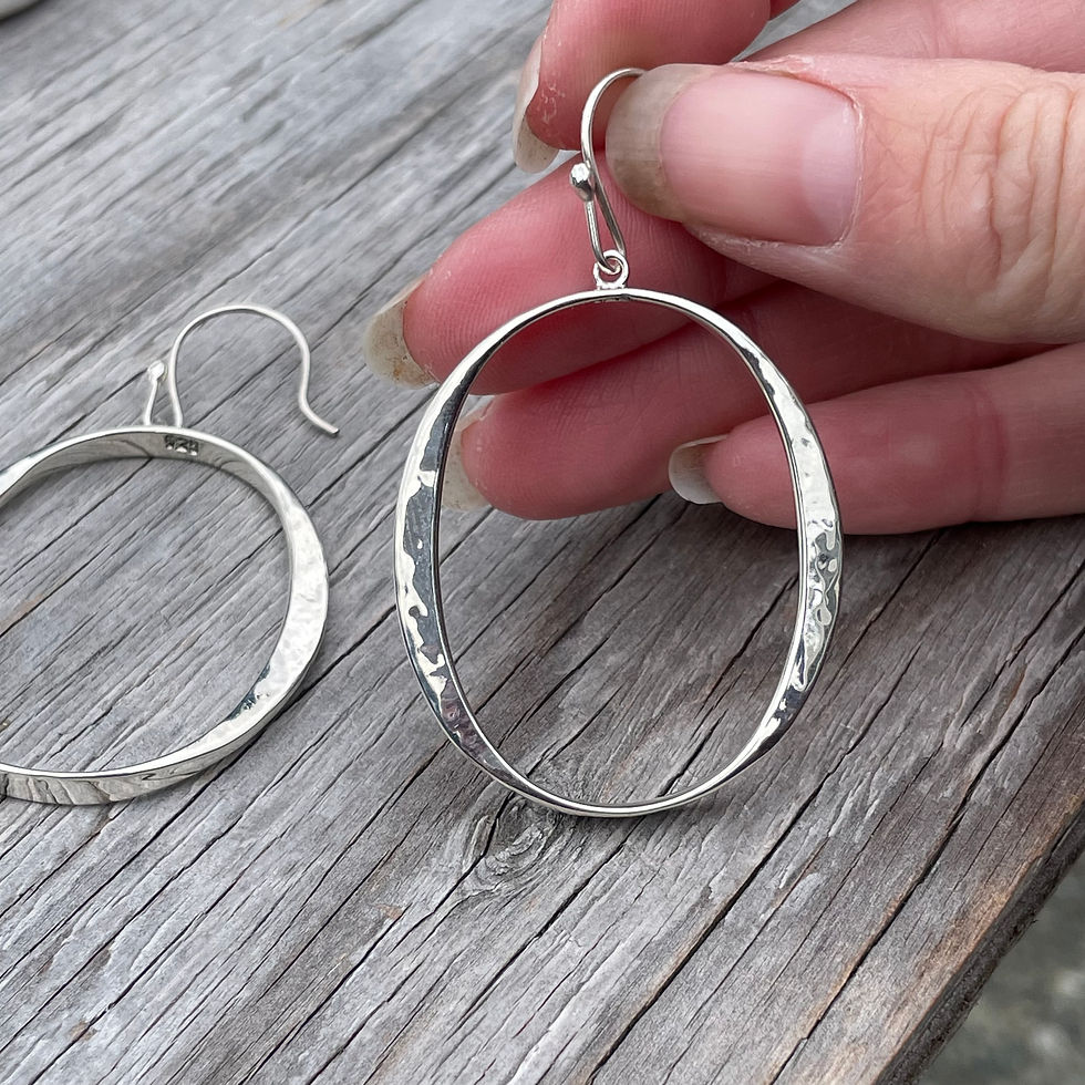 Thumbnail: Oval hammered silver loop earrings