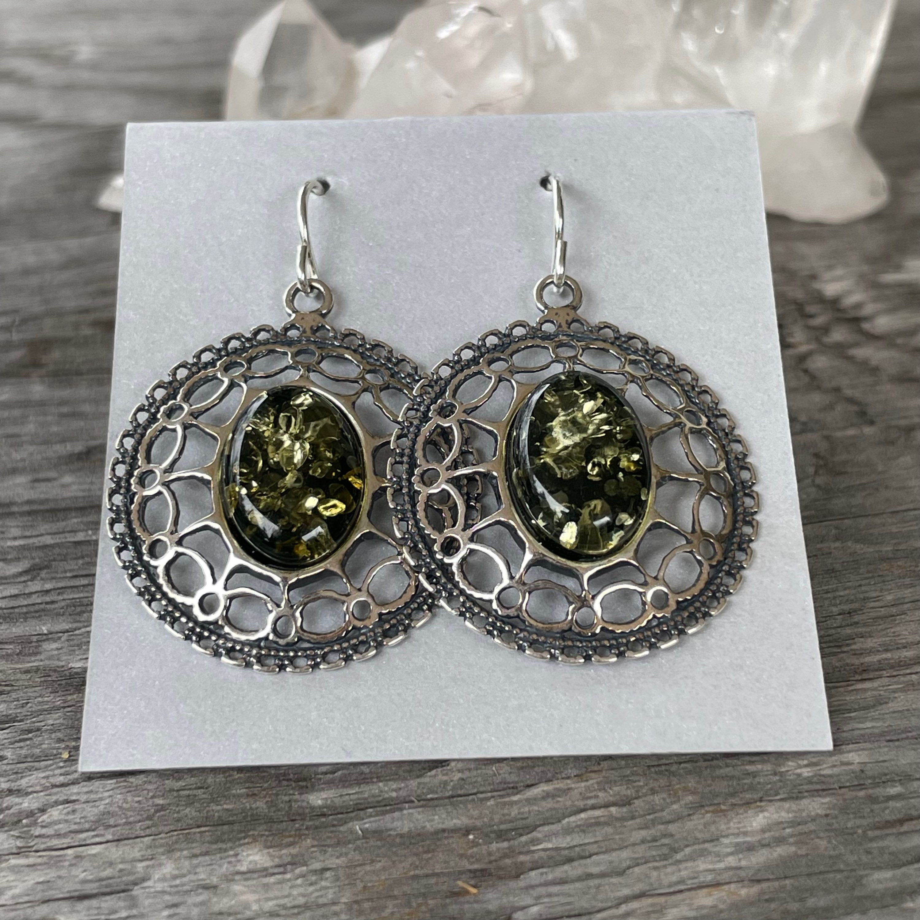 Oval lace setting green amber earrings 