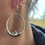 Thumbnail: Roulette 18 crescent moon with garnet earring