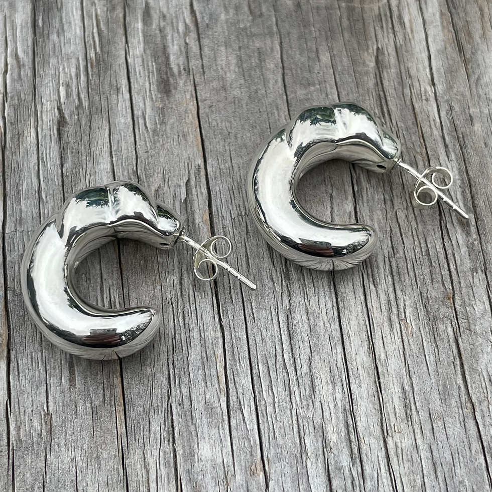 Thumbnail: Puffy graduated silver stud hoops