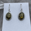Thumbnail: Green Amber ovals with braided setting earrings