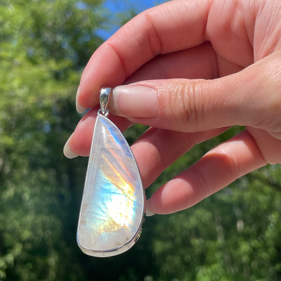 Thumbnail: Large sail shaped rainbow moonstone pendant