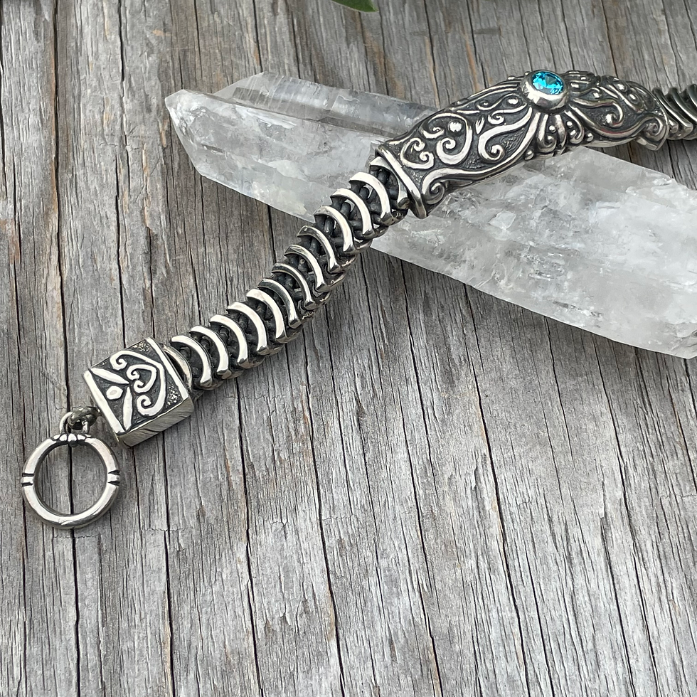 Thumbnail: Blue topaz in heavy silver bracelet