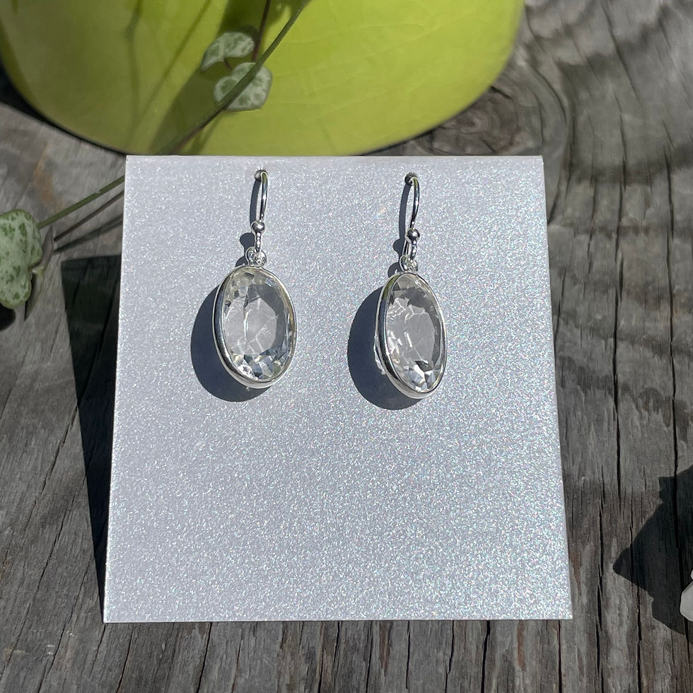 Thumbnail: Quartz crystal long oval faceted earrings