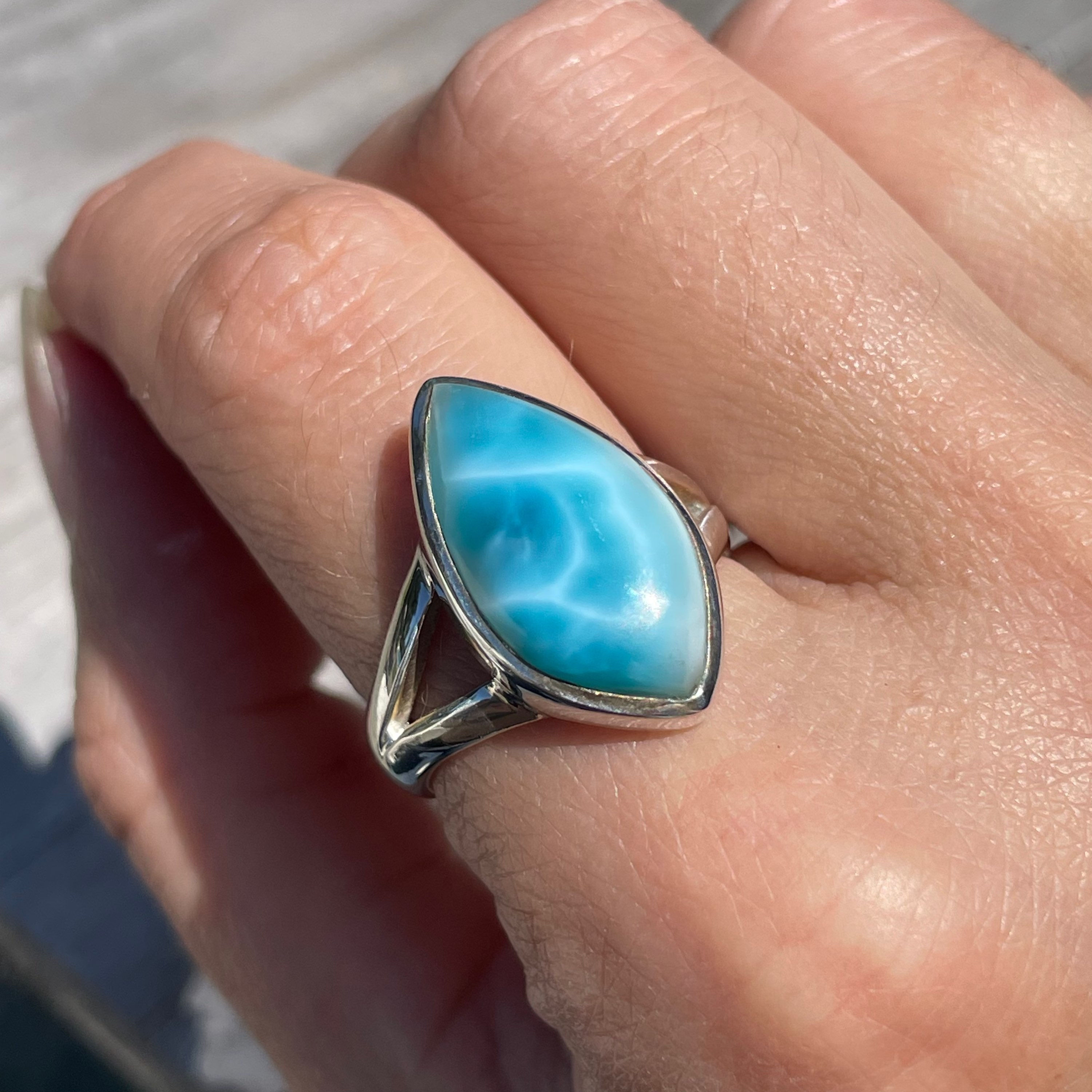 Cutout band marquis shaped larimar ring