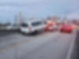 van being towed on highway