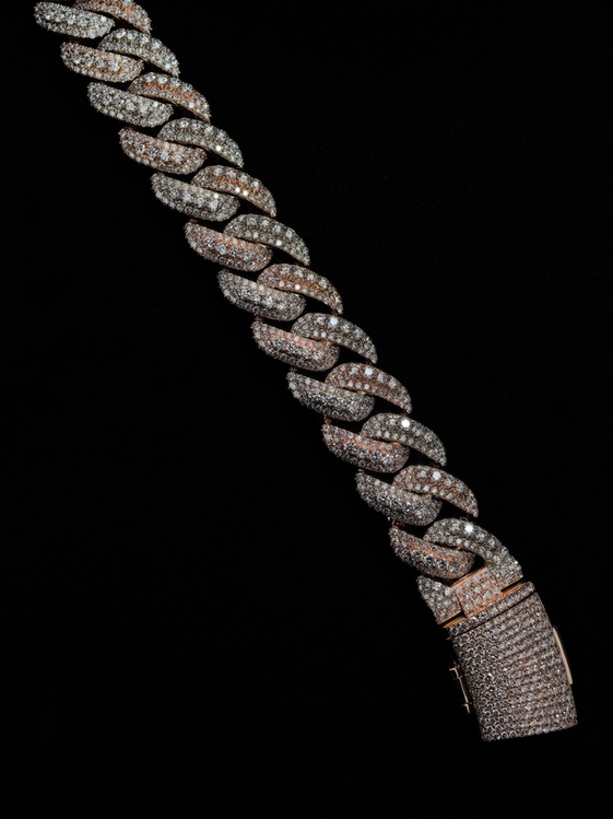 Classic-style lock on two-tone Cuban chain.