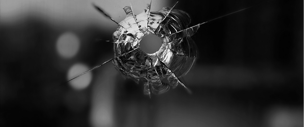 windshield with a bullet hole, shattered class
