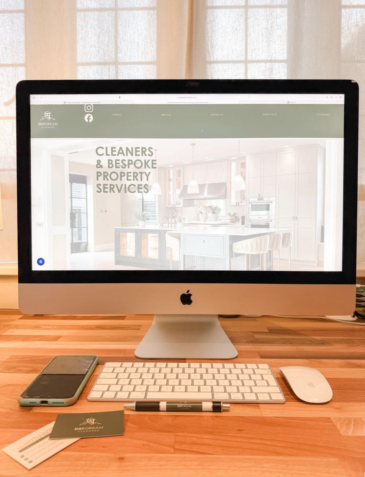 image of computer screen and day dream cleaners branding