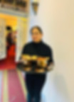 Staff carrying food to the table