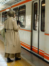 Woman stepping onto a German train