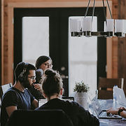 Some of the Unsplash Team fam working to