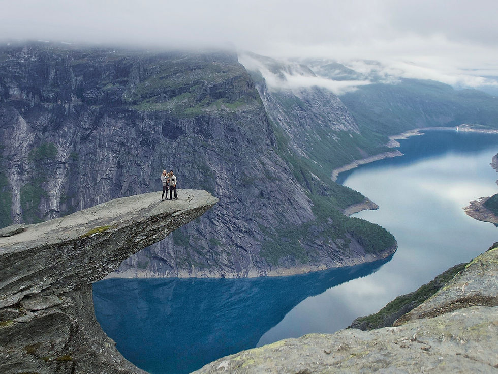 Trolltunga, Norway, with. a toddler