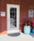 Entrance to our acupuncture clinic in Tulsa with flowers.