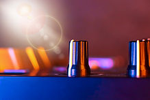 Close up of knobs on a mixing console